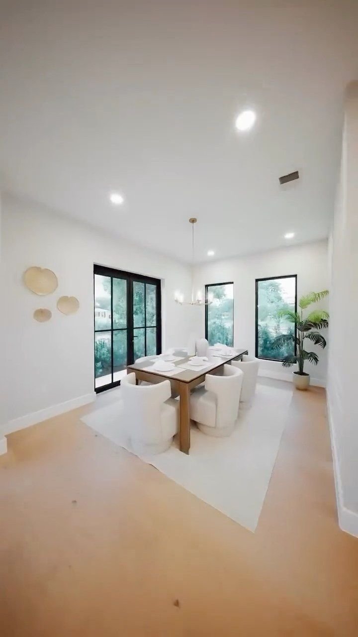 A bright new-build kitchen and living room in Audubon Park, from Yuliana's video tour
